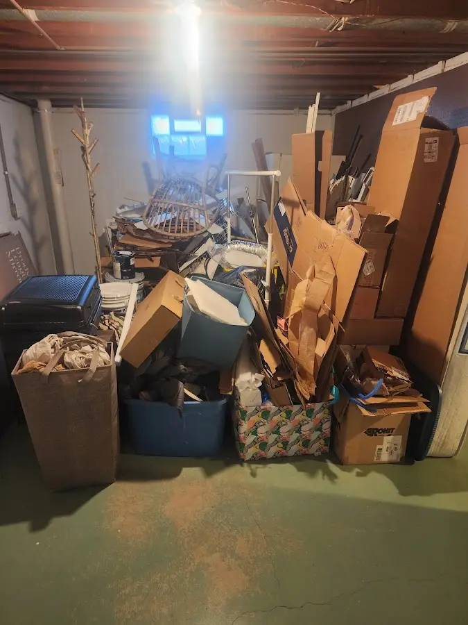 Roll-off dumpster container at job site for Cleanout Dumpster Rental in Red Springs